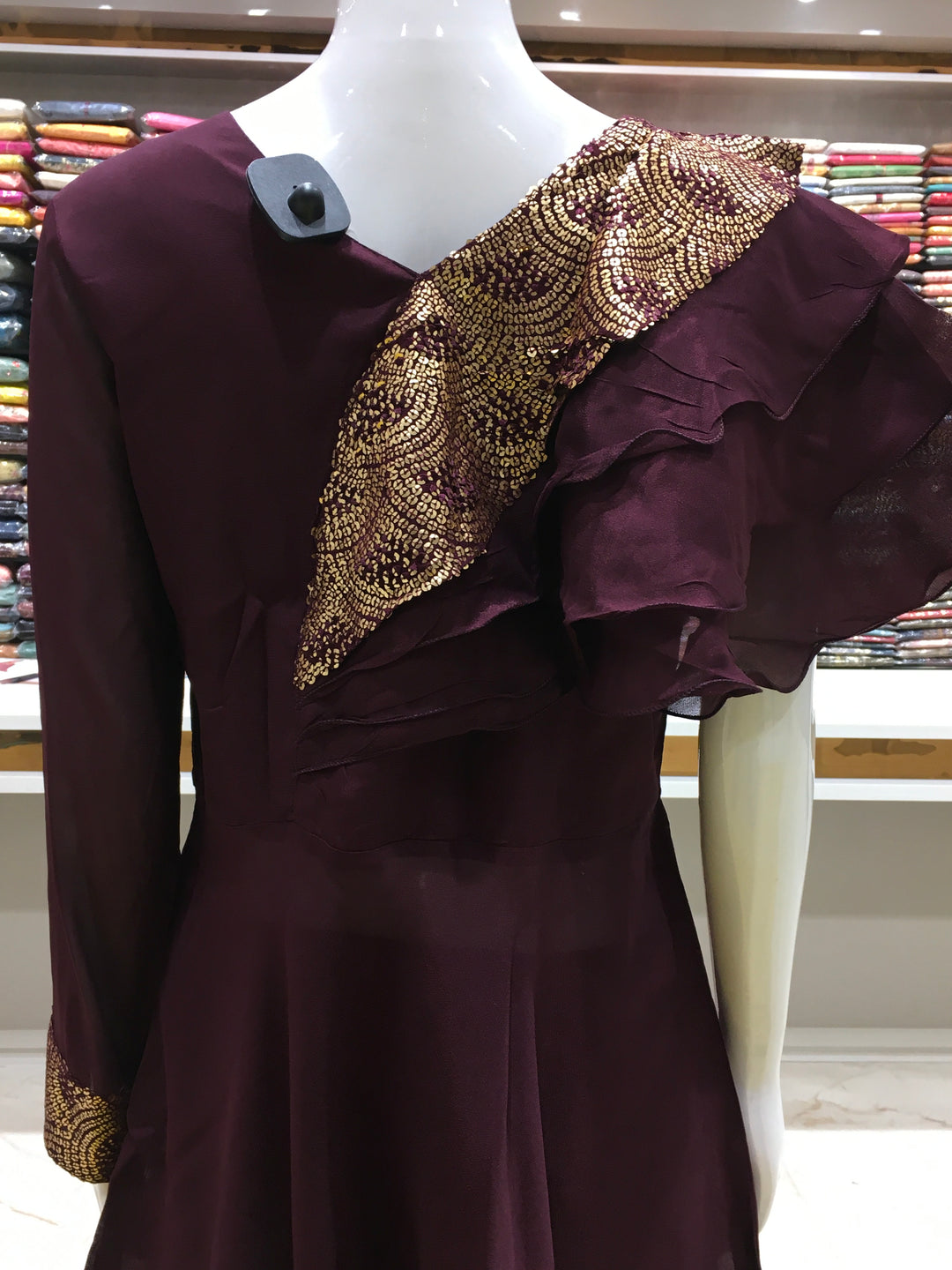 Maroon Designer women’s top set in georgette with embellished shoulder and modern sleeve cut