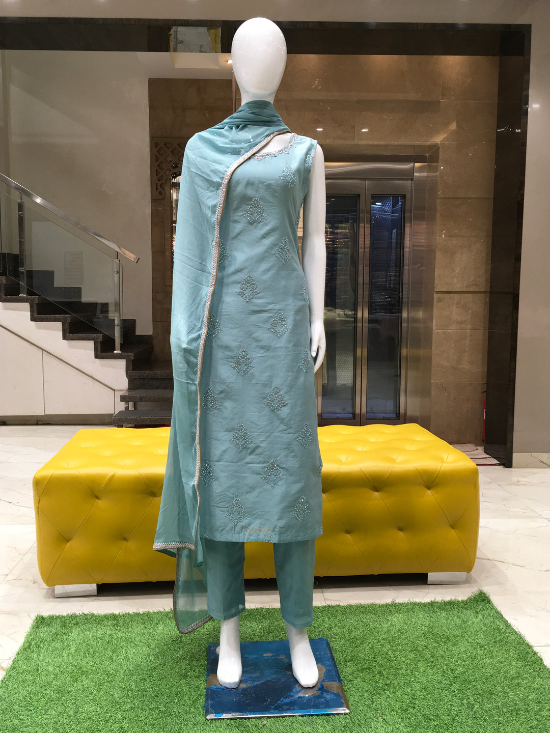 Chanderi Cotton Straight Cut Salwar Kameez with embroidered patch neckline, microstone detailing, pencil pants, and lace-trimmed chiffon dupatta.
