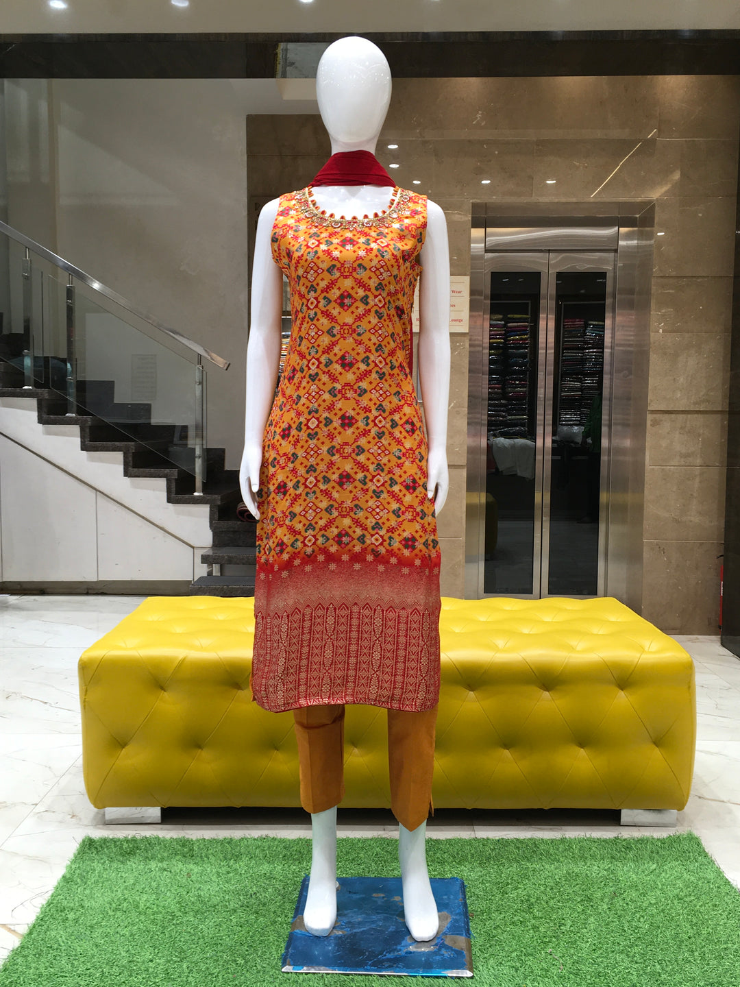 Sleeveless mustard chanderi cotton salwar kameez with patola print