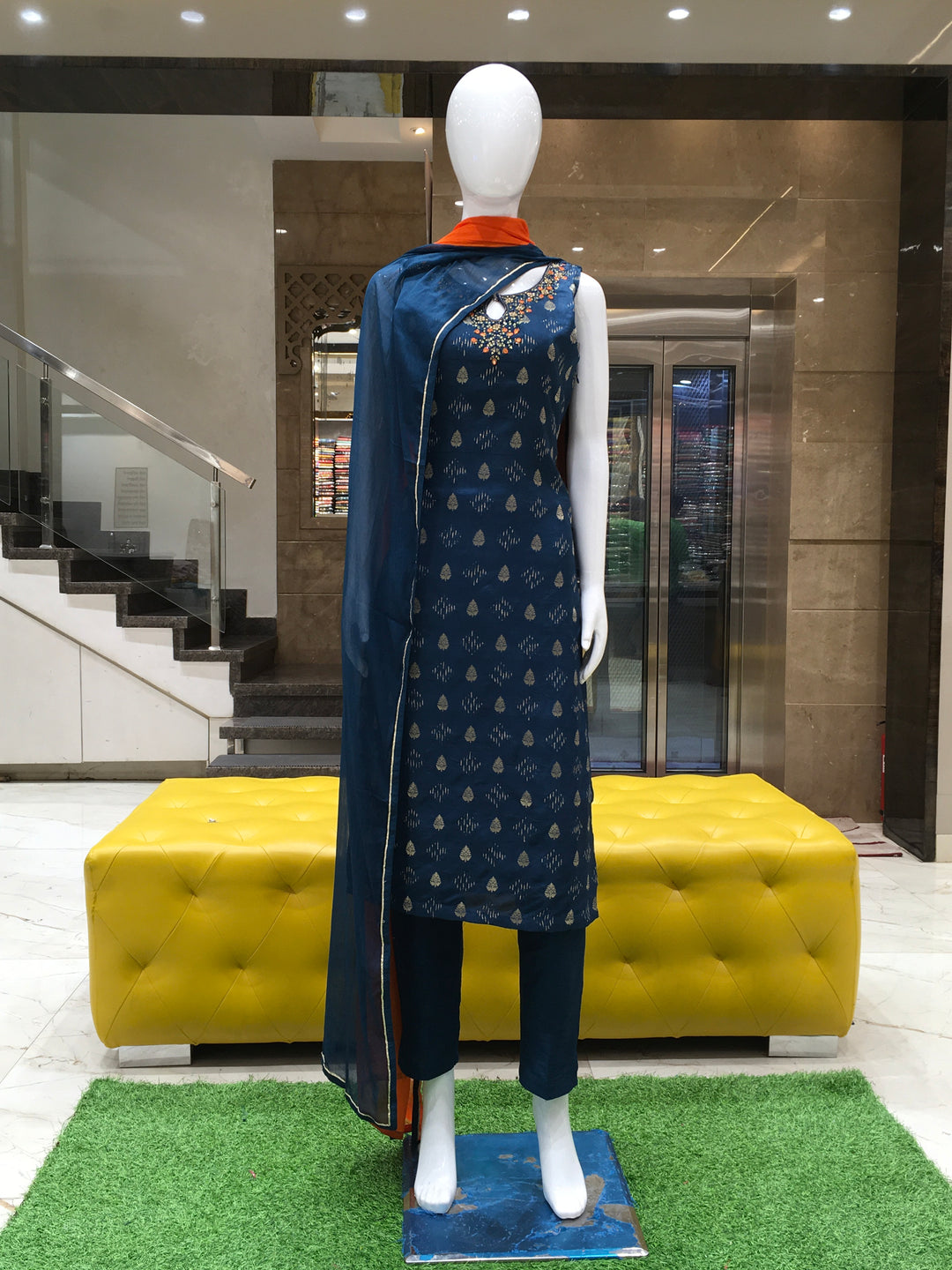 Navy blue salwar kameez with mirror and bead embellished neckline