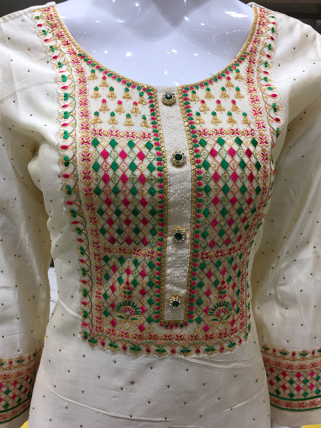 Traditional Ivory salwar kameez for women with festive neckline work and soft chiffon dupatta