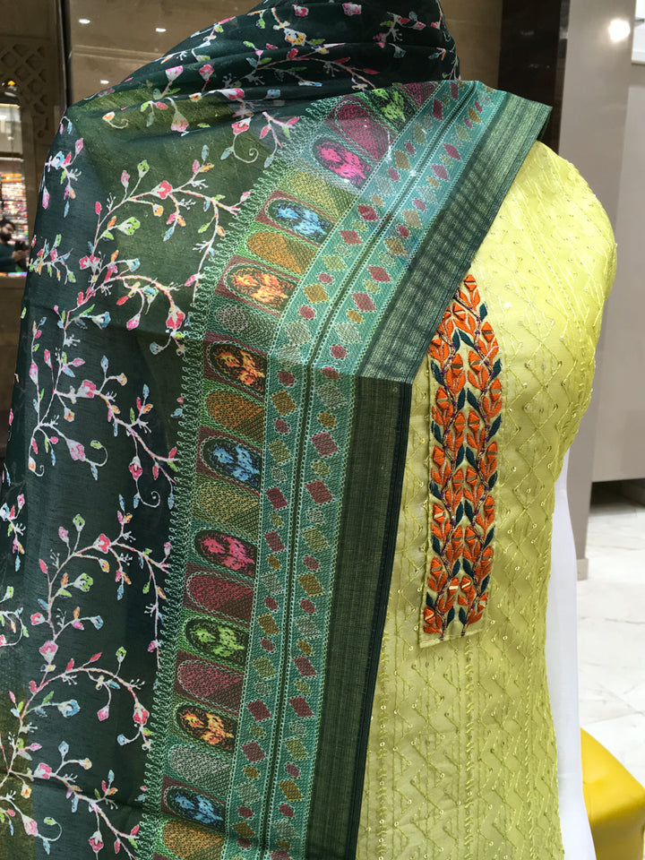 Light green salwar kameez in chanderi fabric paired with printed cotton dupatta
